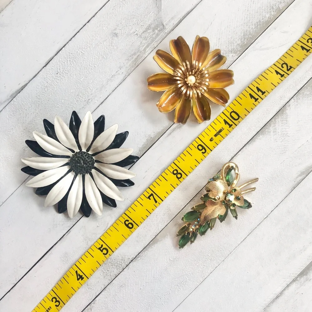 Set of three Vintage Metal and Rhinestone Costume Jewelry Floral Brooches